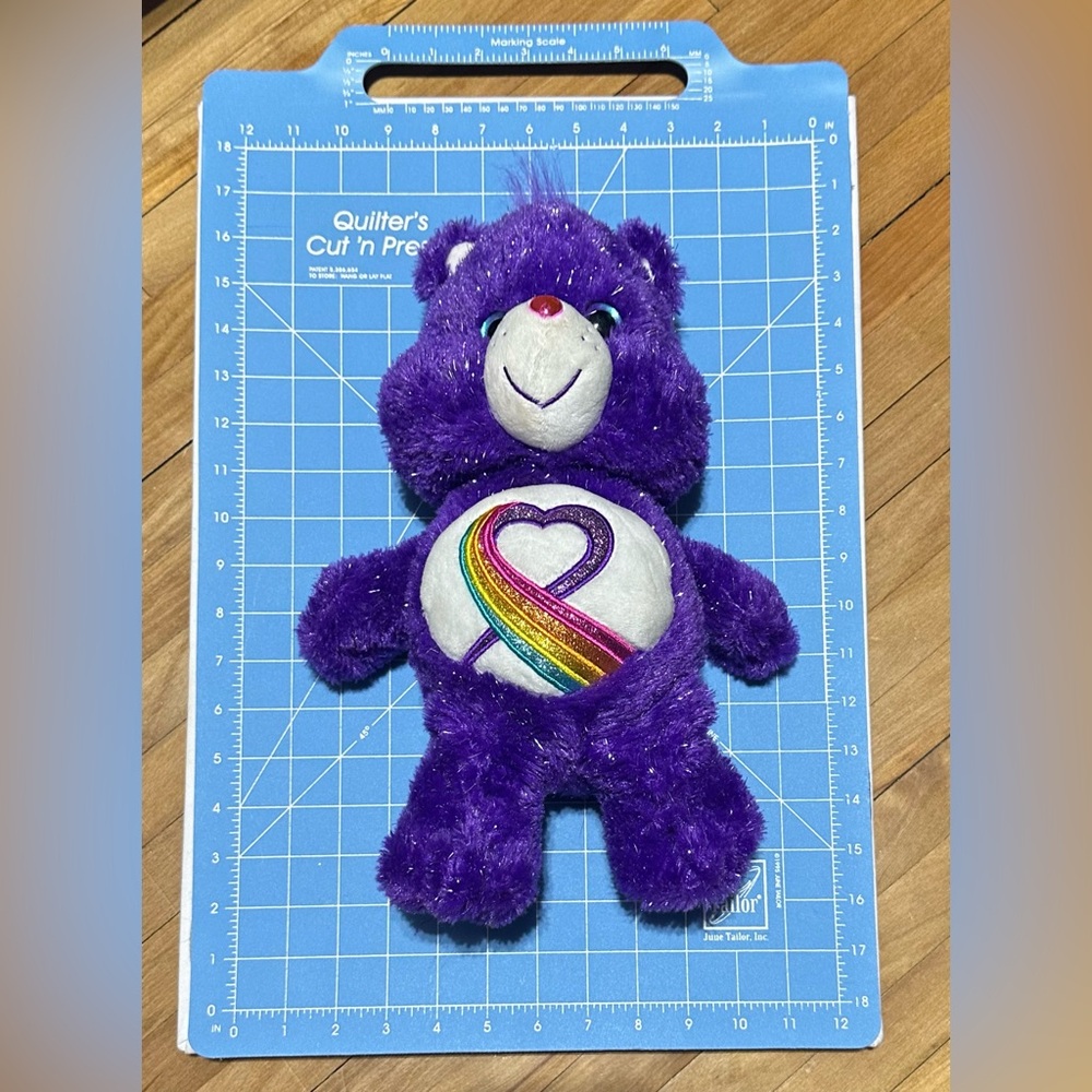 Care Bears 35th Anniversary Rainbow Heart Plush Bear Purple Glitter Limited
2017 - Picture 4 of 4